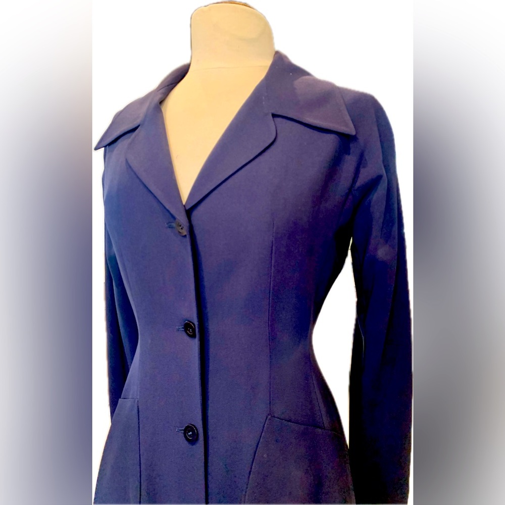 Prada’s full-length jacket has a beautiful bodice. Beautiful drape. A must-have.